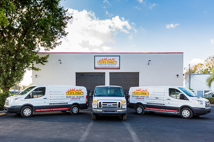 image-trucks in front of building